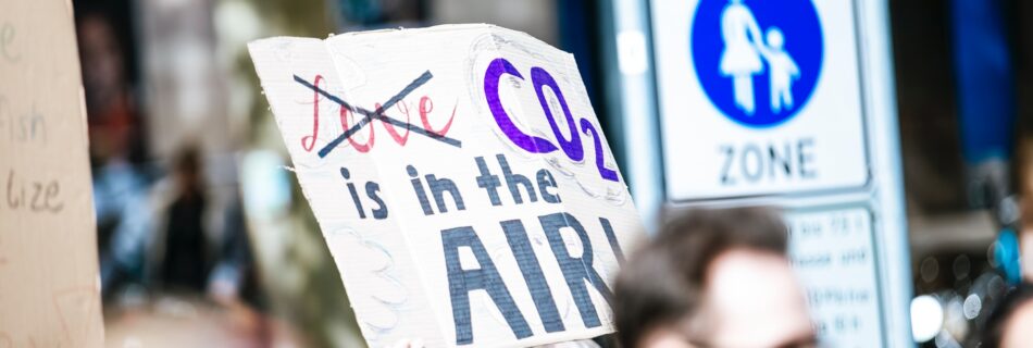 Placard reading: "CO2 is in the air."
